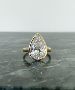 GIA Certified 5.04 Carat Pear Brilliant Cut Diamond VVS2 Clarity Bezel Set Ring