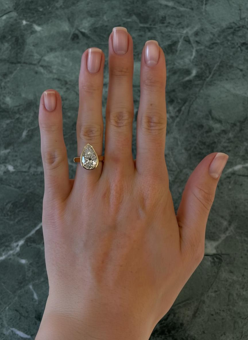 Pear Cut GIA Certified 5 Carat Pear Brilliant Cut Diamond Bezel Set Ring For Sale