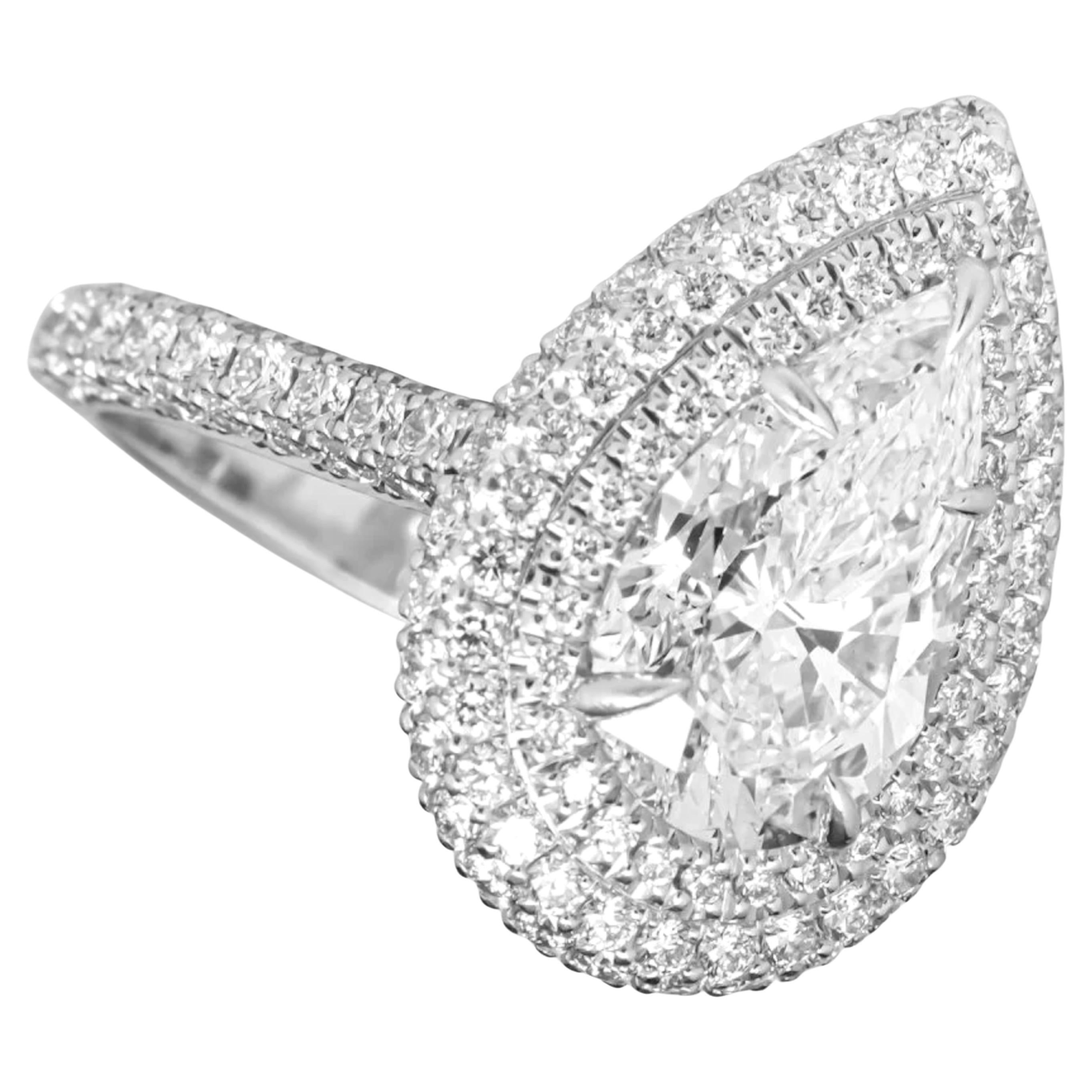 GIA Certified 5 Carat Pear Cut E Color 18K White Gold Diamond Ring In New Condition For Sale In Chicago, IL