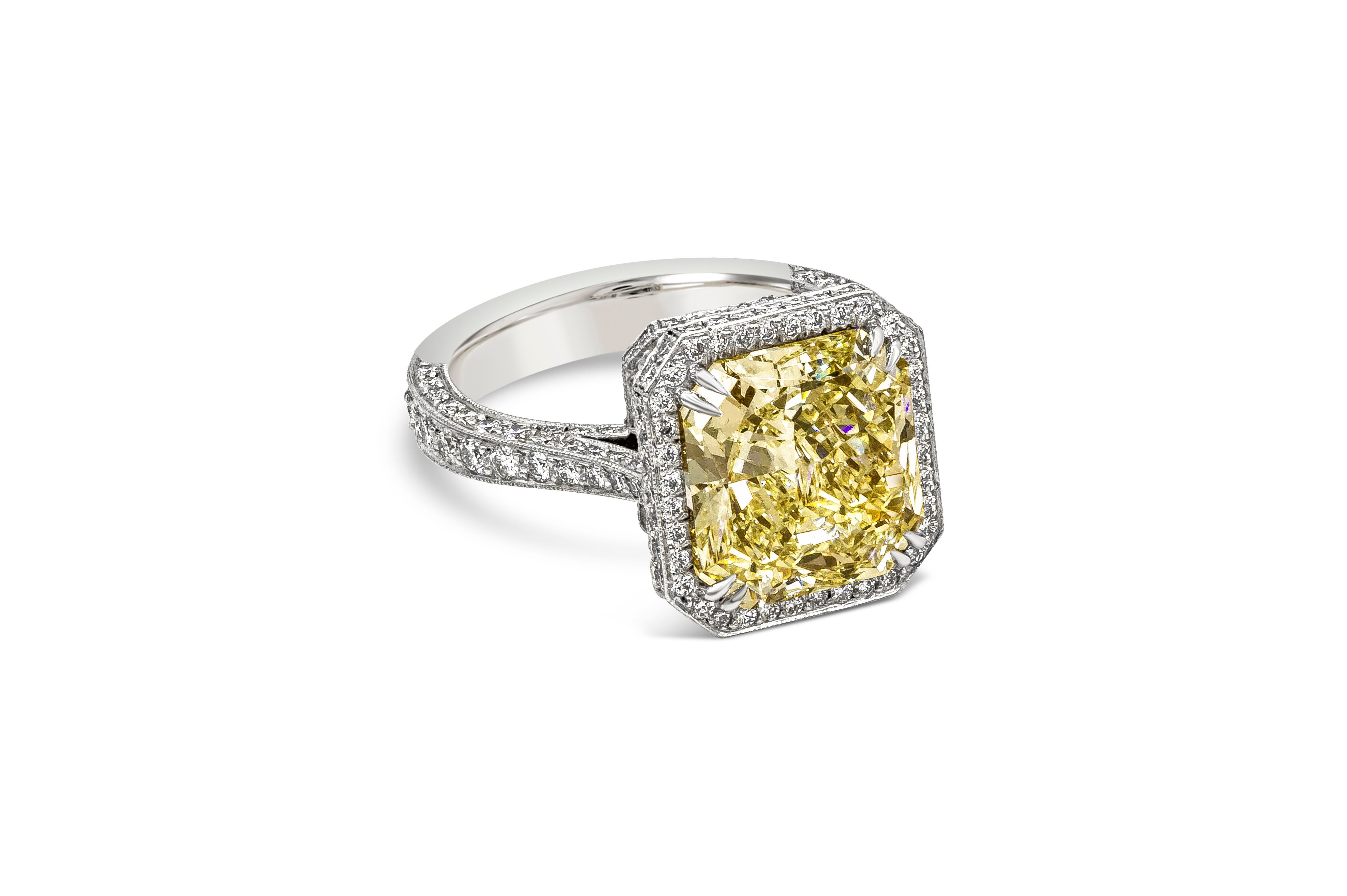 A vintage-looking engagement ring style showcasing a 5.27 carat radiant cut yellow diamond, certified by GIA as Fancy Light Yellow color, VS1 in clarity. Surrounding the center diamond is a brilliant diamond halo in eight prong setting. Shank is