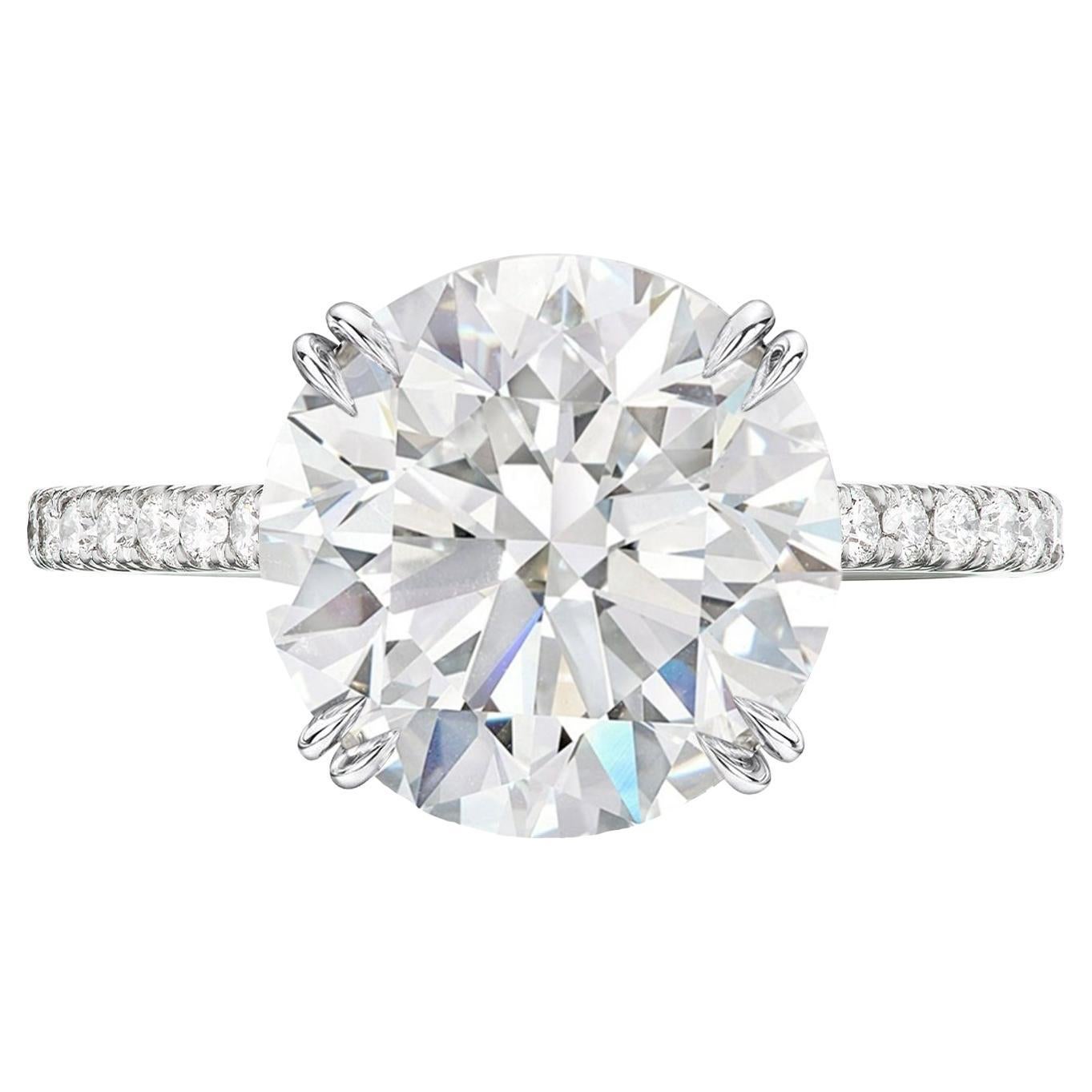 An exquisite GIA certified 5 carat round brilliant cut diamond ring 

Investment grade
D COLOR
VVS2 CLARITY
FAINT FLUORESCENCE
TRIPLE EXCELLENT
