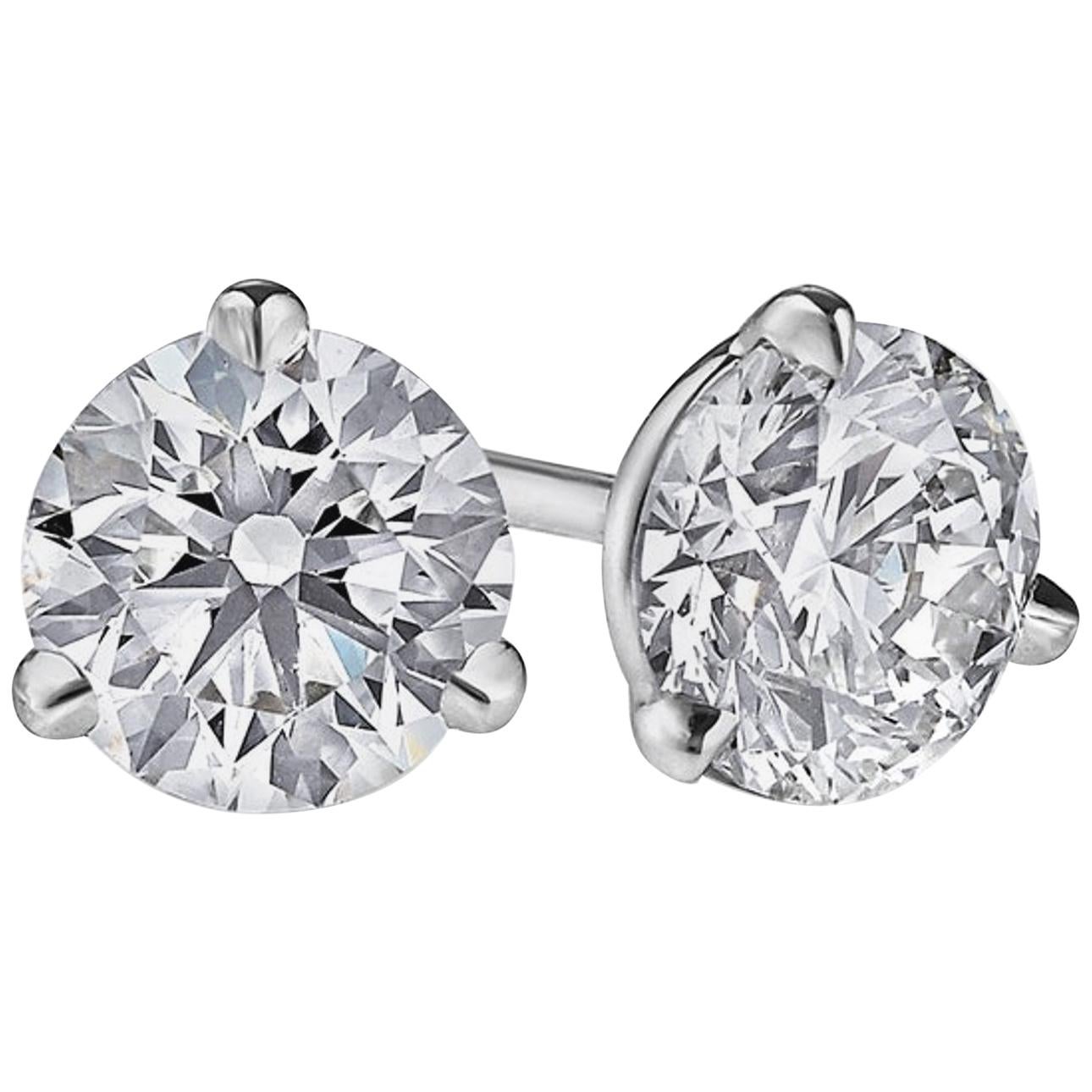 GIA Certified 5 Carat Round Brilliant Cut Diamonds Stud Earrings in Platinum For Sale