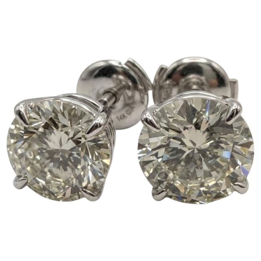 GIA Certified 5 Carat Round Brilliant Diamond Stud Earrings in 18k White Gold