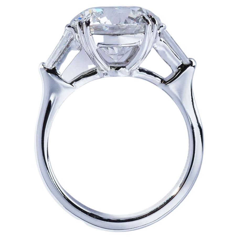 GIA Certified 5 Carat Round Diamond Platinum Ring

excellent polish
excellent symmetry 
faint fluo