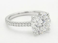 GIA Certified 5.03 Carat Round Cut Diamond Ring with pavè in 18K White Gold
