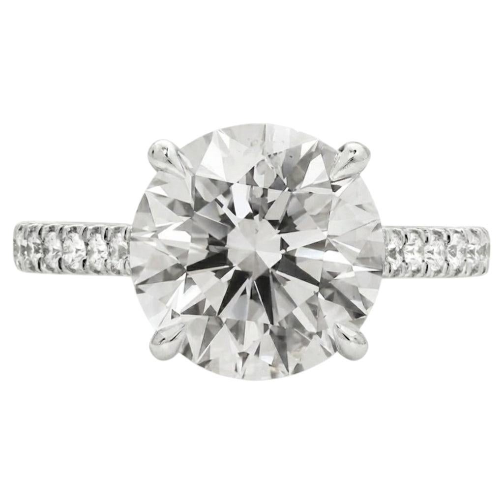 GIA Certified 5.03 Carat Round Cut Diamond Ring with pavè in 18K White Gold