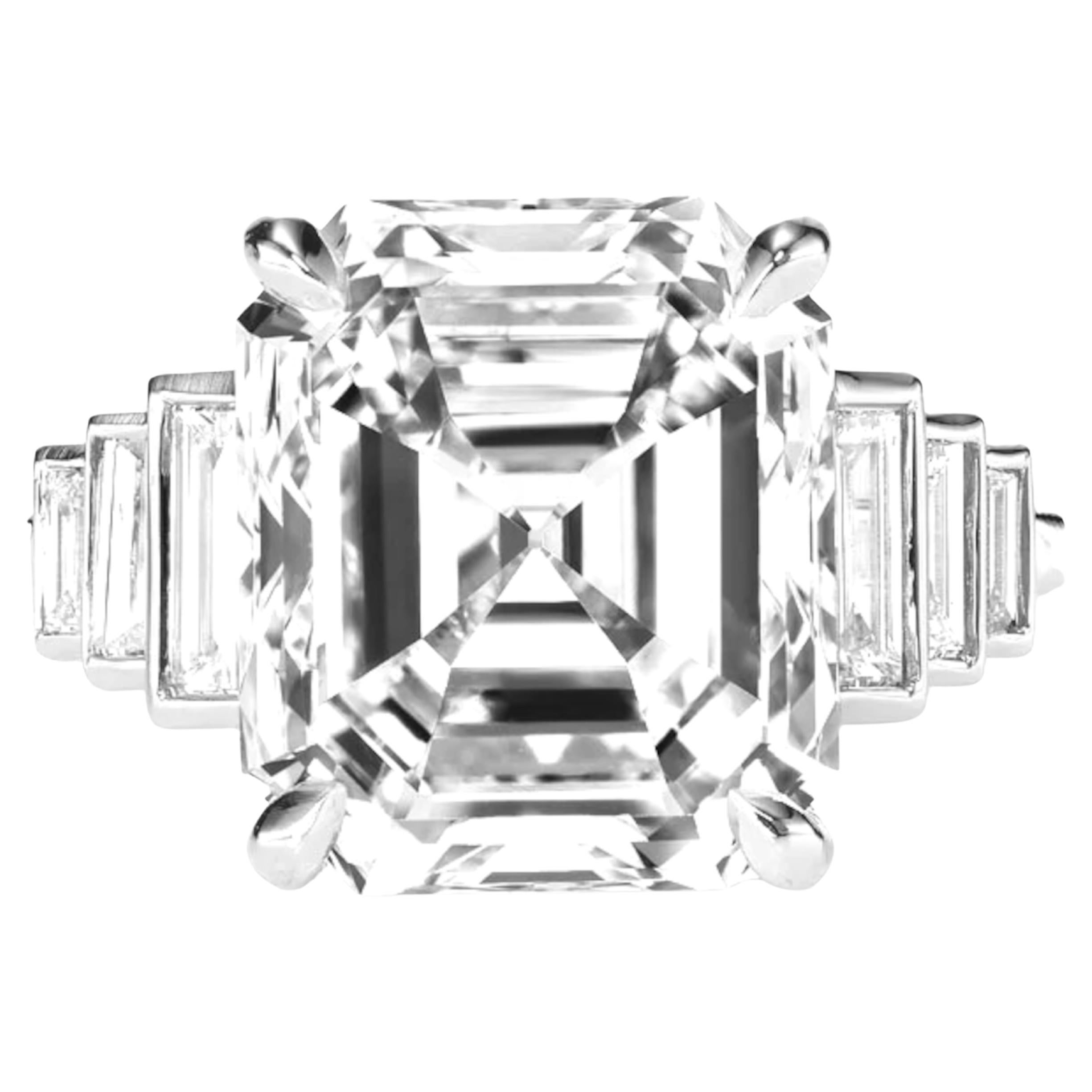 Stunning 5ct Emerald Cut Diamond Ring with Baguettes

The ring centers a GIA-certified 5-carat Emerald cut diamond of G color, VVS2 clarity. The stone is set in a 4 prong platinum setting. Three tiered vertical baguettes are bezel set to each side