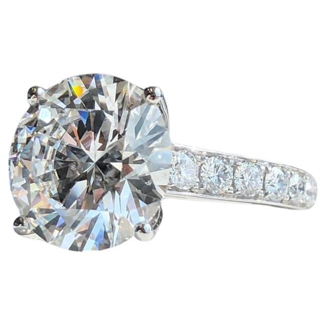 Contemporary GIA Certified 5.22 Carat Round VVS2 Clarity Diamond Platinum Ring with Pavè For Sale