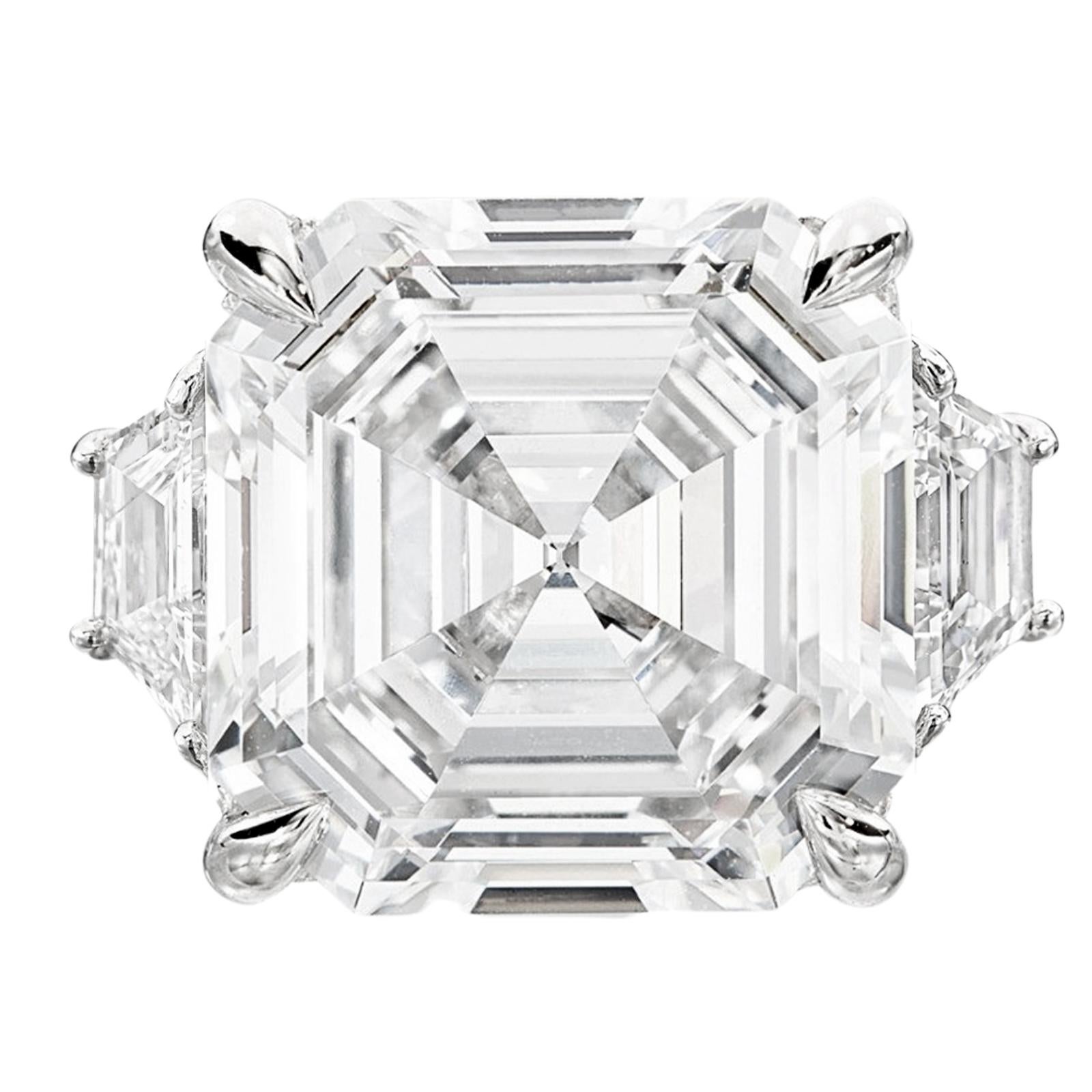 Contemporary GIA Certified 5 Carat Sq Emerald Cut Diamond with Trapezoid Diamonds on side For Sale