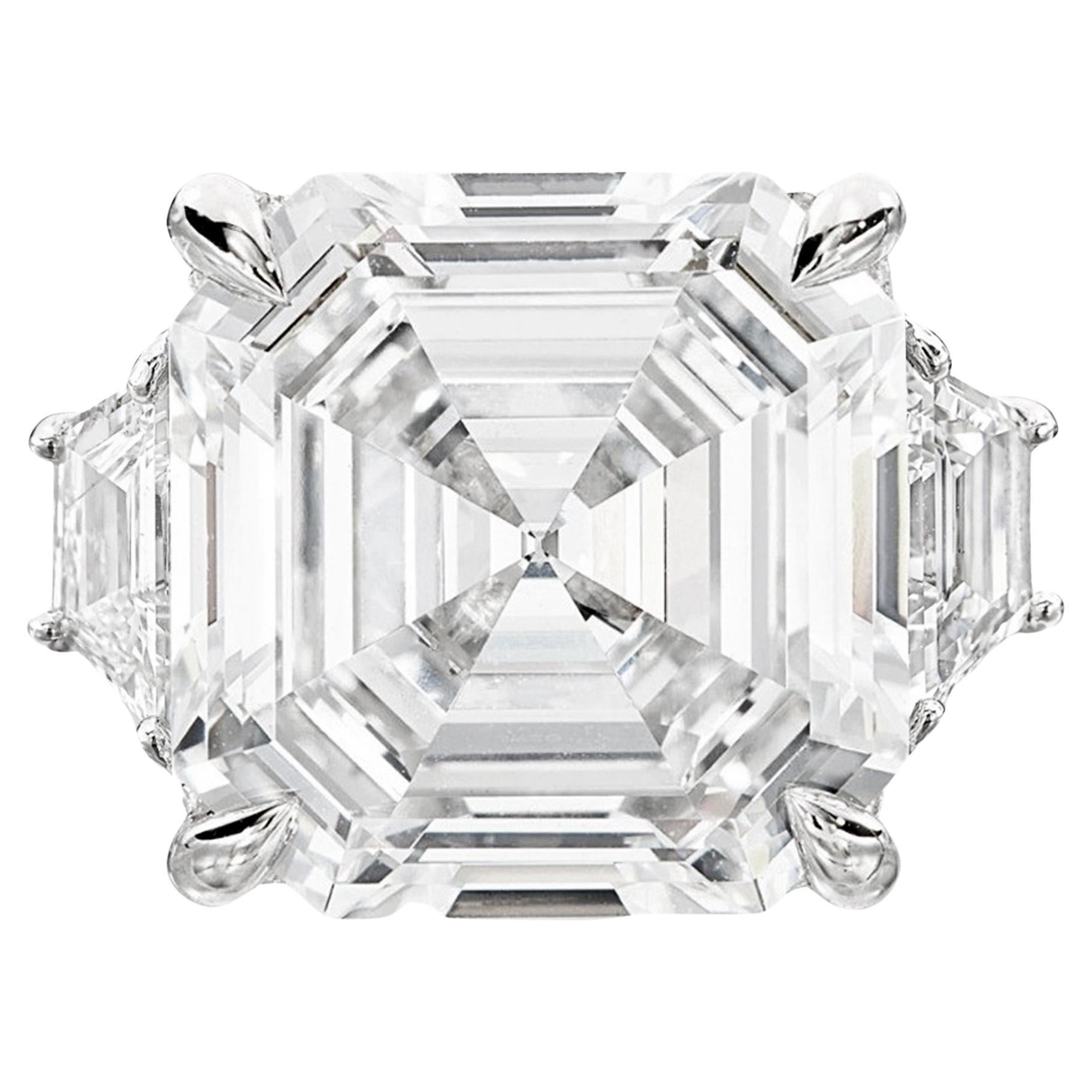 GIA Certified 5 Carat Sq Emerald Cut Diamond with Trapezoid Diamonds on side For Sale
