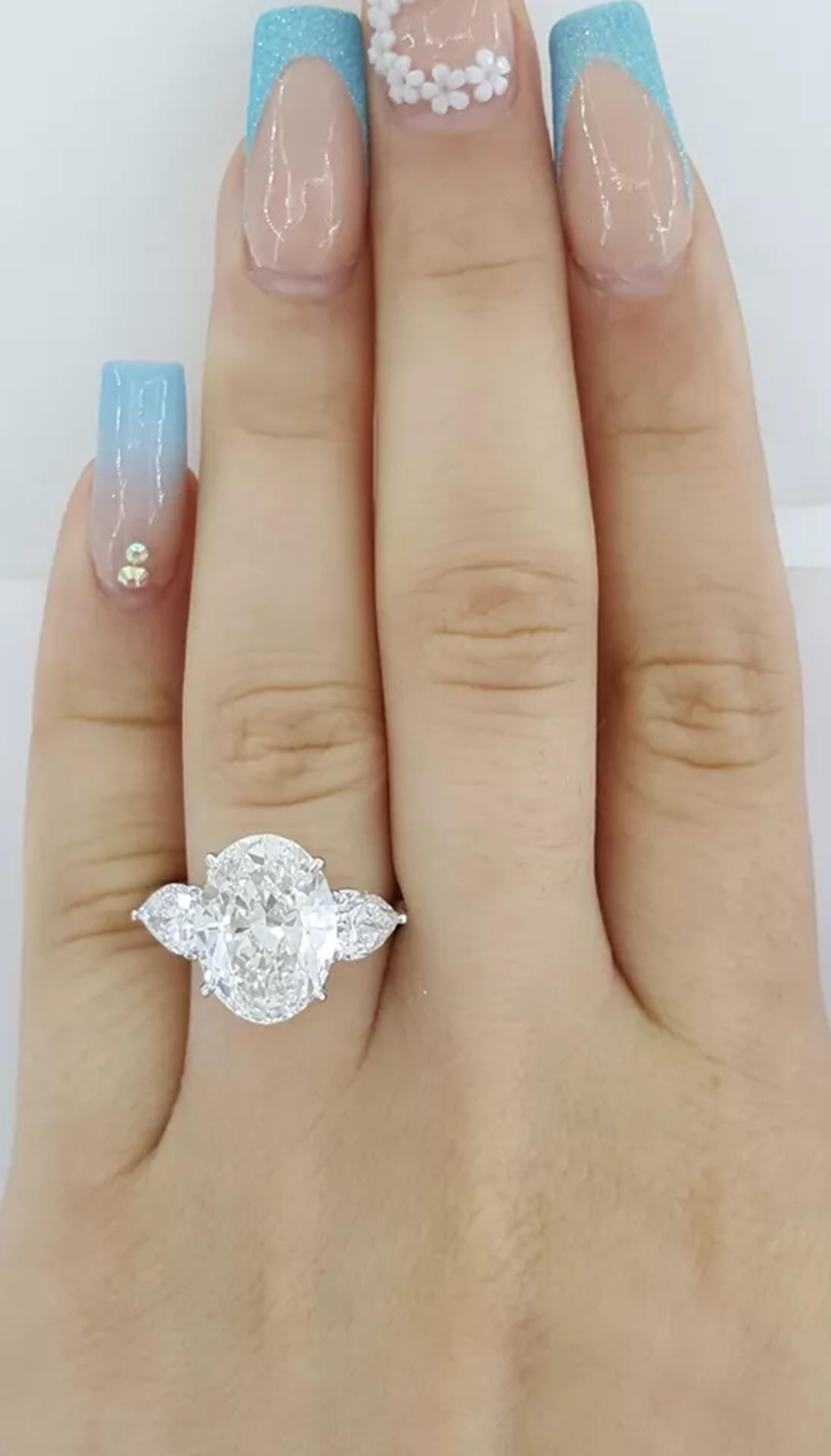 Oval Cut GIA Certified 5 ct Total Weight Oval Brilliant & Pear Shaped Diamond Ring For Sale