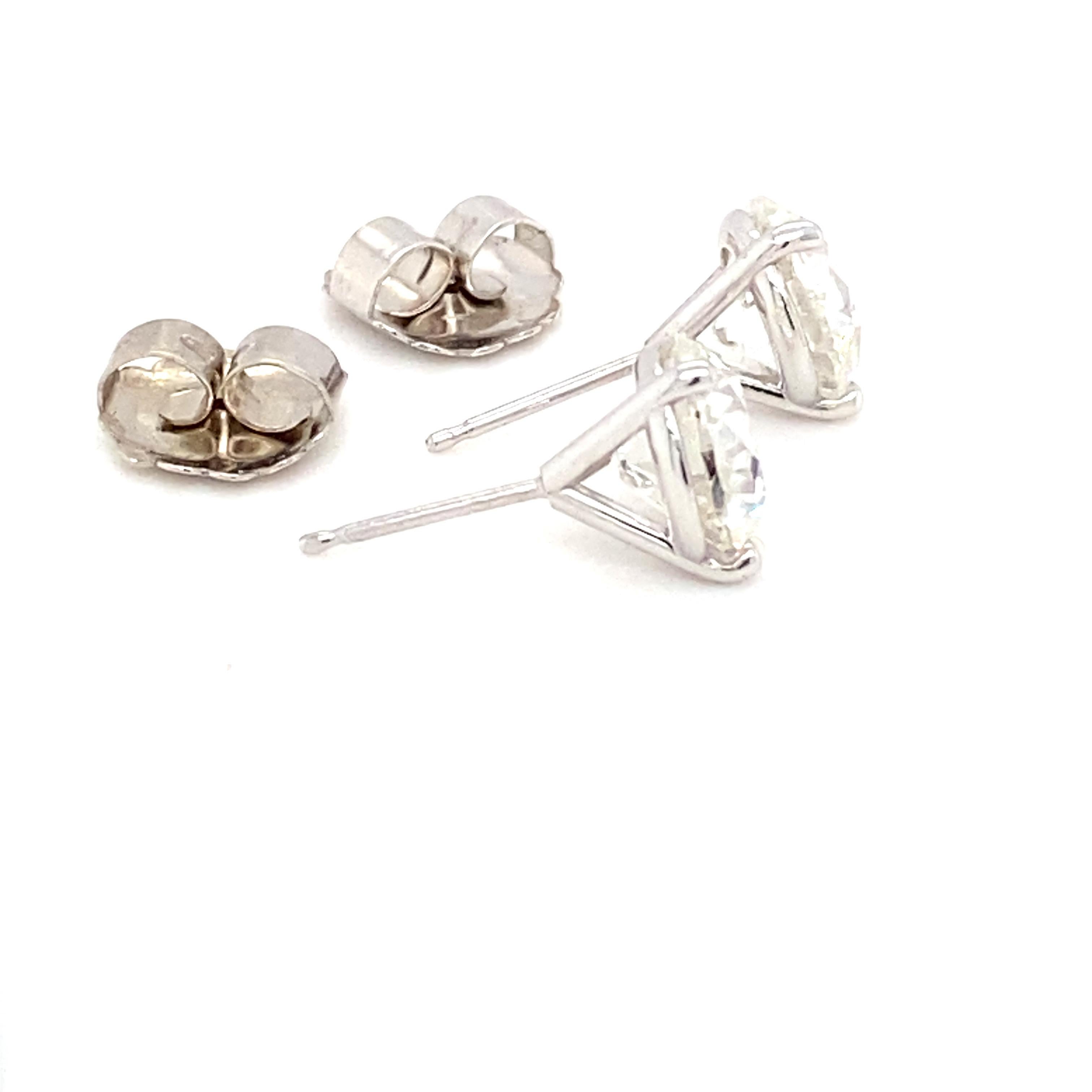 Women's GIA Certified 5.00 Carat Brilliant Cut Diamond Stud Earrings For Sale