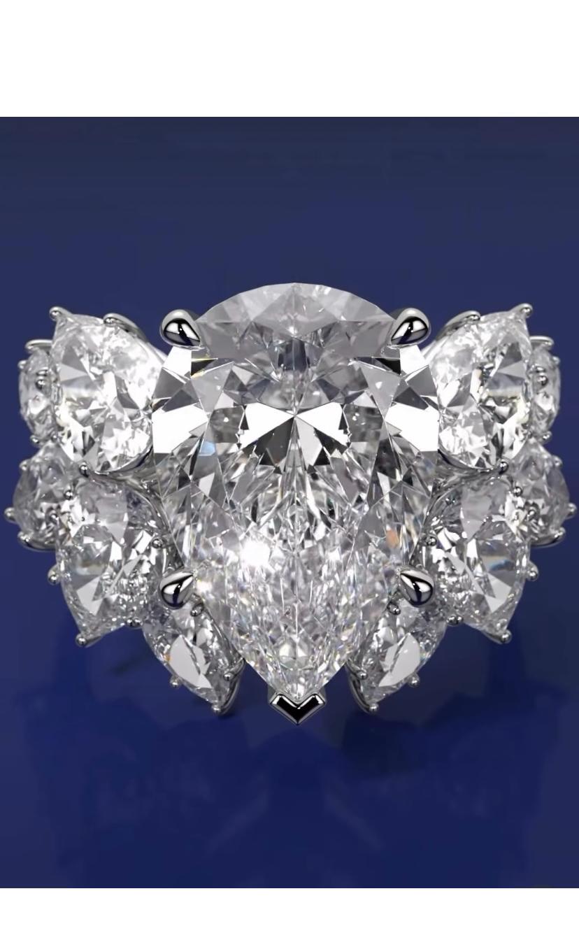 Step into a realm of unparalleled luxury with this magnificent Diamonds ring . The centerpiece , a captivating pear shape diamond, exuding a luxury and sophistication.
Adorned  with dazzling diamonds, meticulously crafted to enhance the ring's