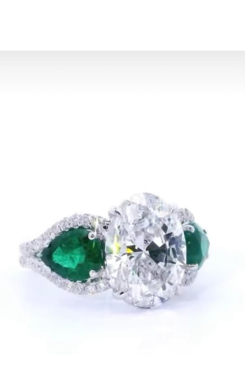 GIA-zertifizierter Solitär-Ring, 5,00 Karat ovaler Diamant, Smaragde, 18 Karat Gold, Solitär (Ovalschliff) im Angebot