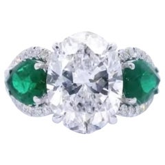 GIA Certified 5.00 Carats Oval Shape Diamond Emeralds 18K Gold Solitaire Ring