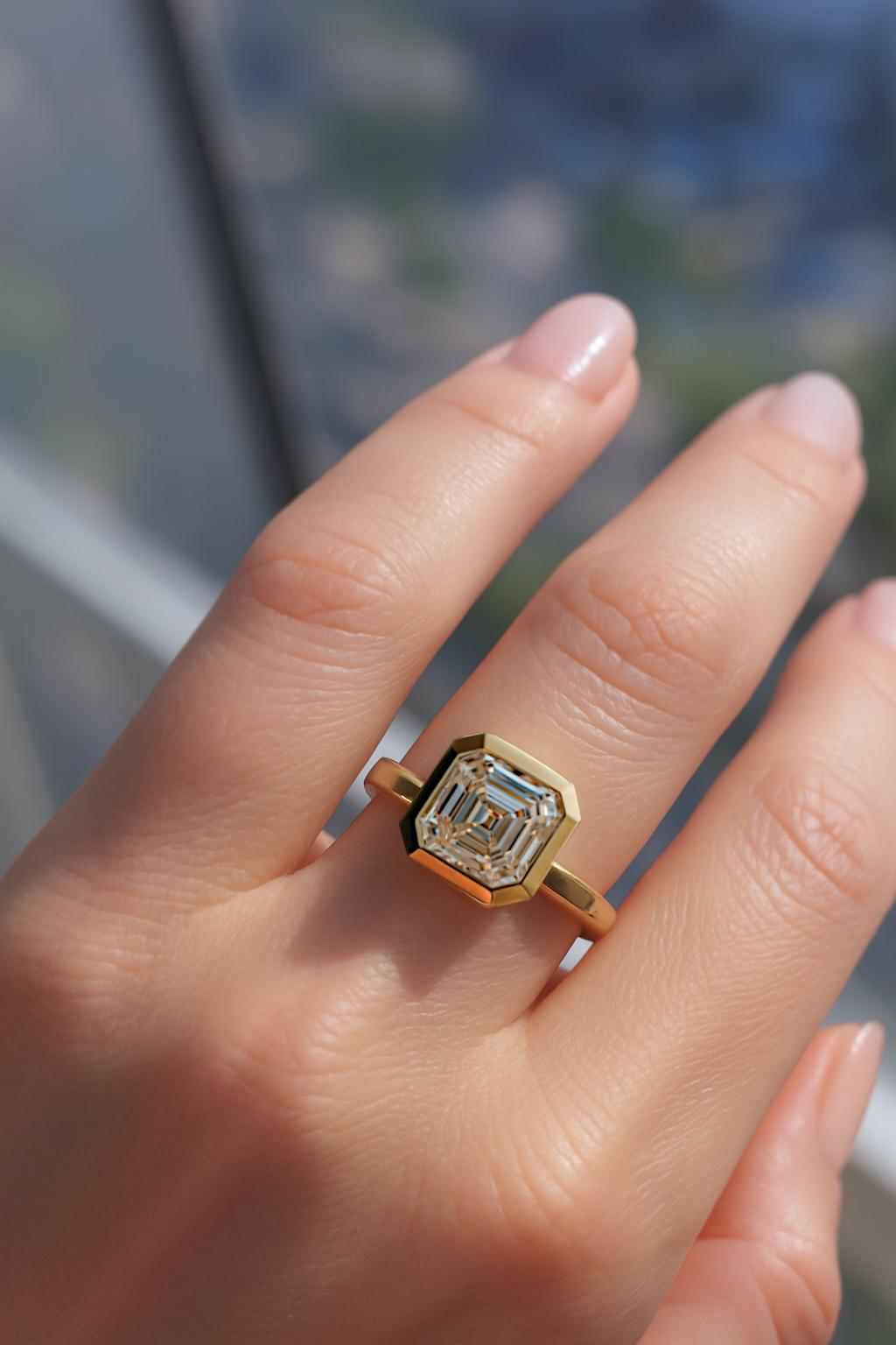 Contemporary GIA Certified 5.01 Carat Asscher Cut Diamond Engagement Ring in 18K Yellow Gold For Sale