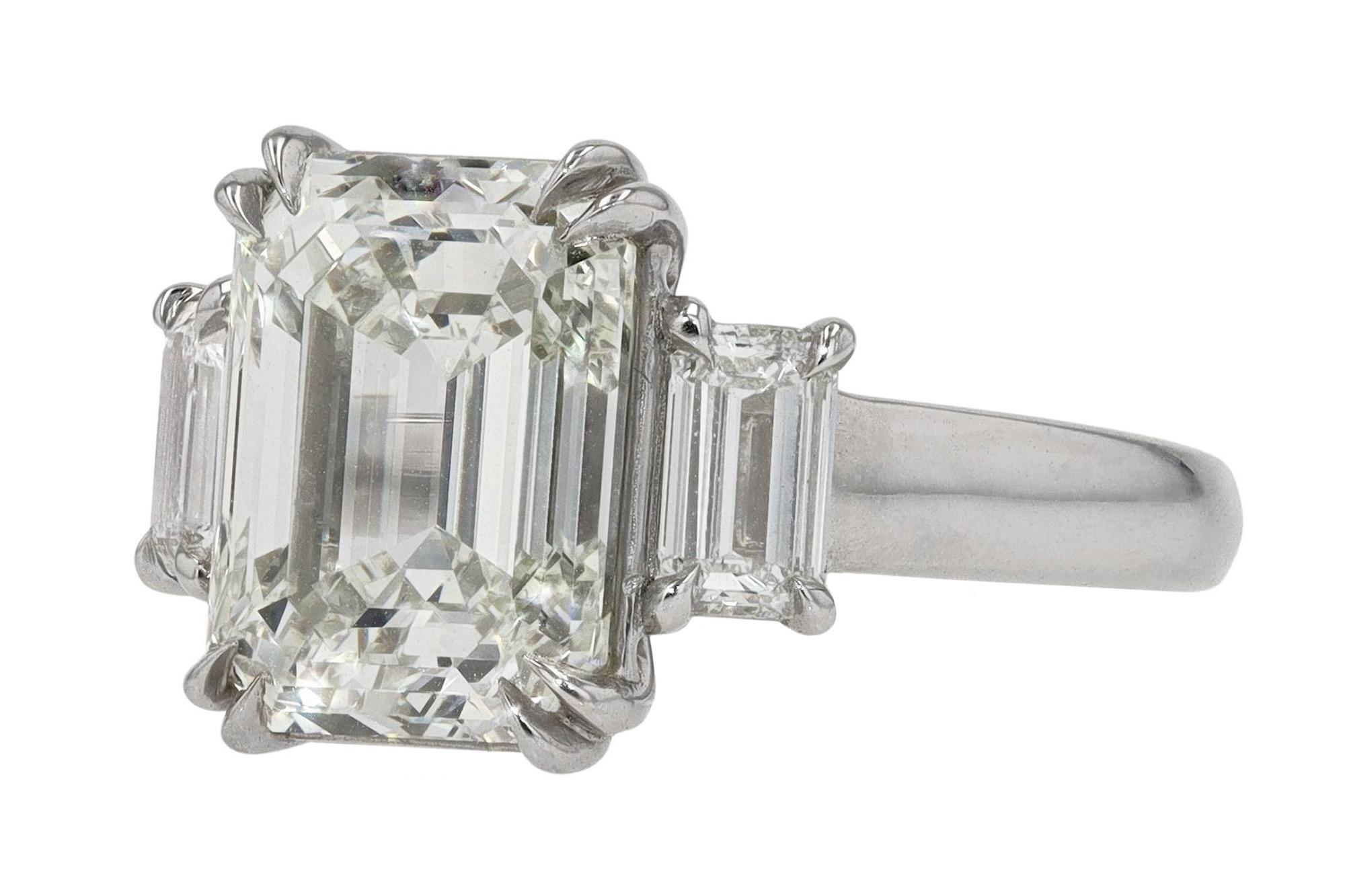 Contemporary GIA Certified 5.01 Carat Emerald Cut Diamond Engagement Ring For Sale