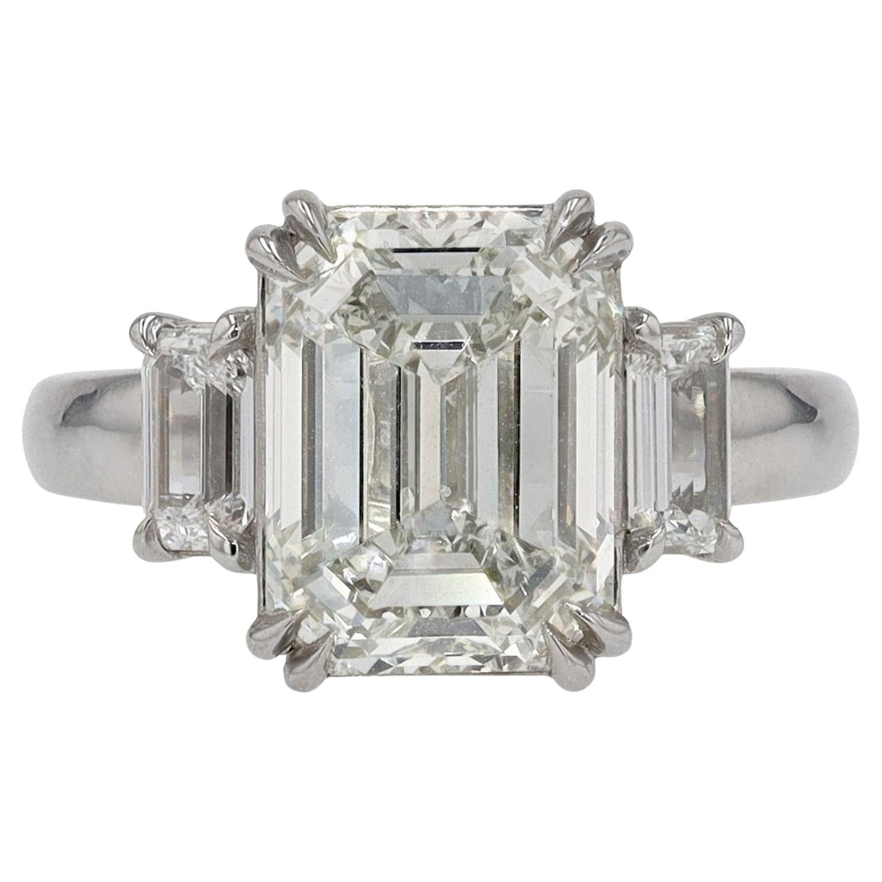GIA Certified 5.01 Carat Emerald Cut Diamond Engagement Ring For Sale
