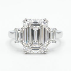 GIA Certified 5.01 Carat Emerald Cut Diamond VVS1 Three Stone Ring in Platinum