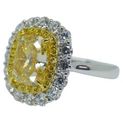 GIA Certified 5.01 Carat Fancy Yellow Diamond Engagement Ring