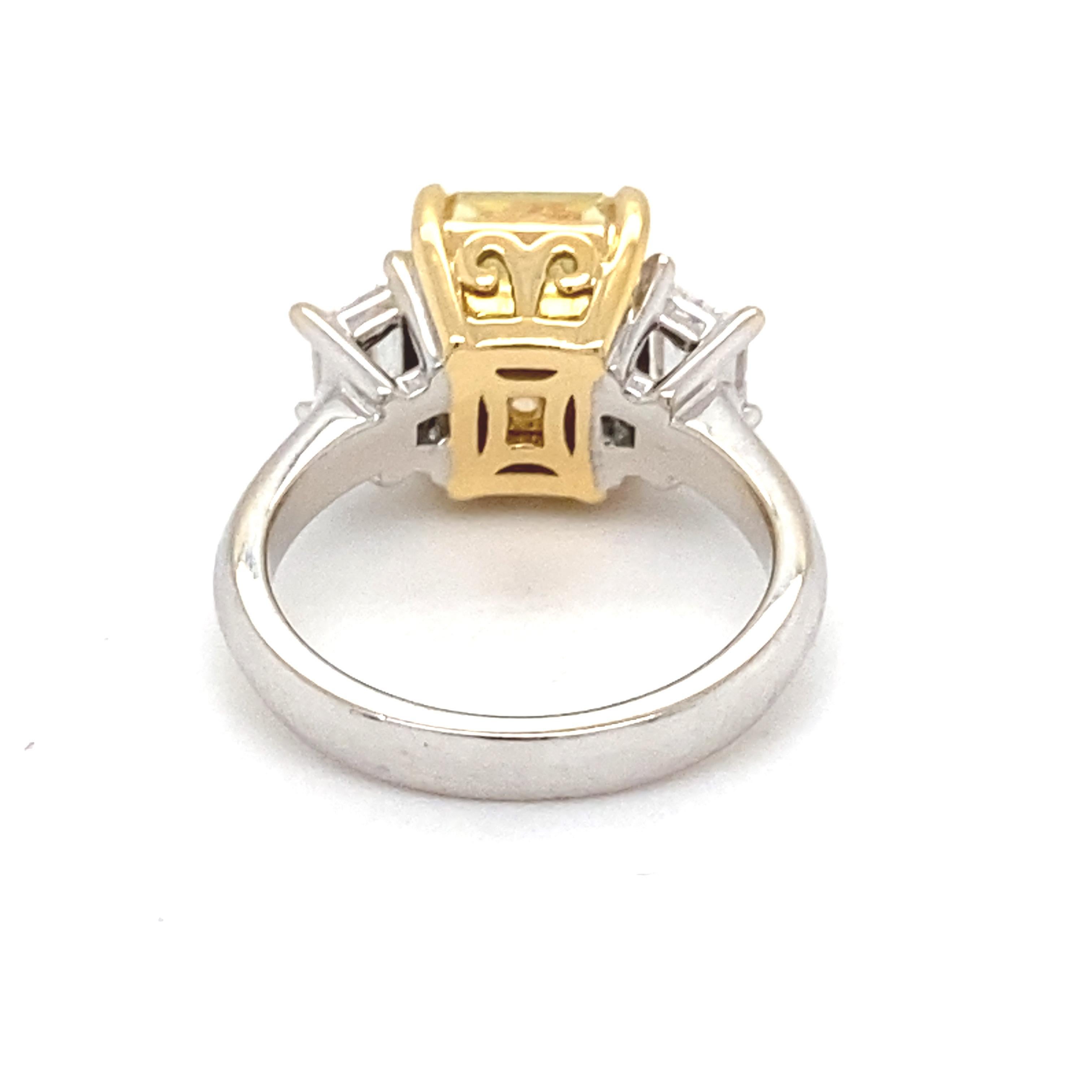 GIA Certified 5.01 Carat Intense Fancy Yellow SI2 Cushion Diamond Ring For Sale 4