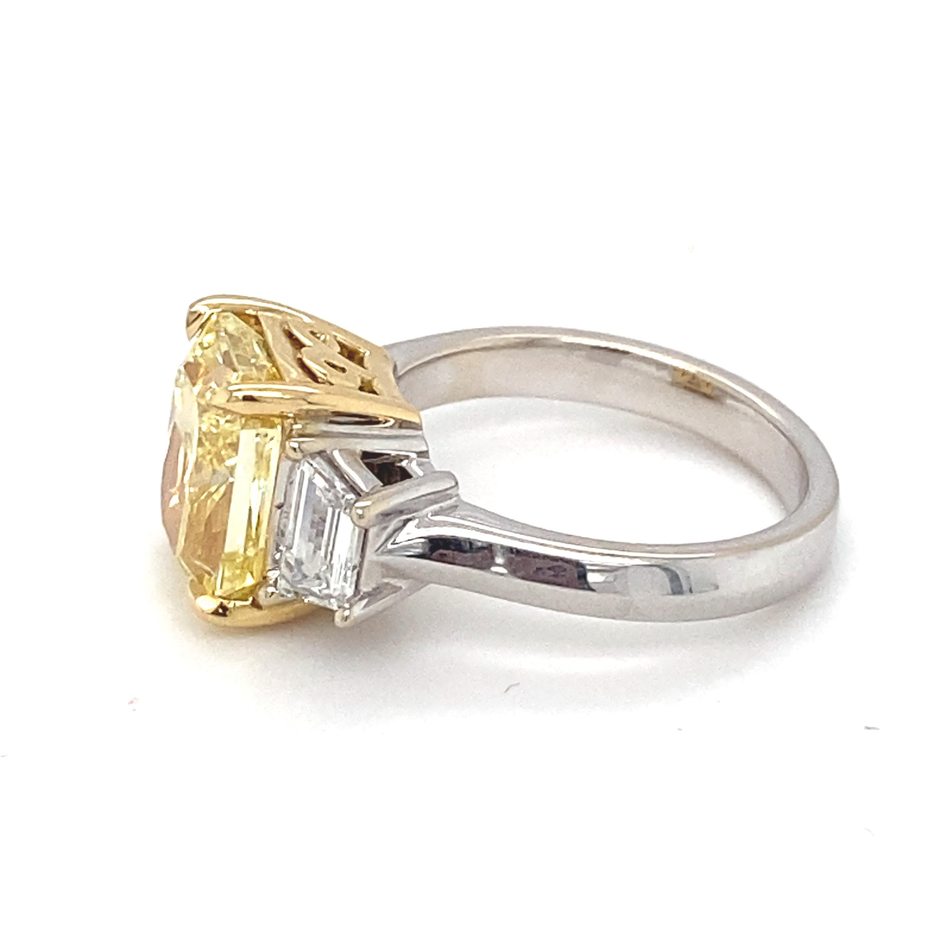 GIA Certified 5.01 Carat Intense Fancy Yellow SI2 Cushion Diamond Ring For Sale 7