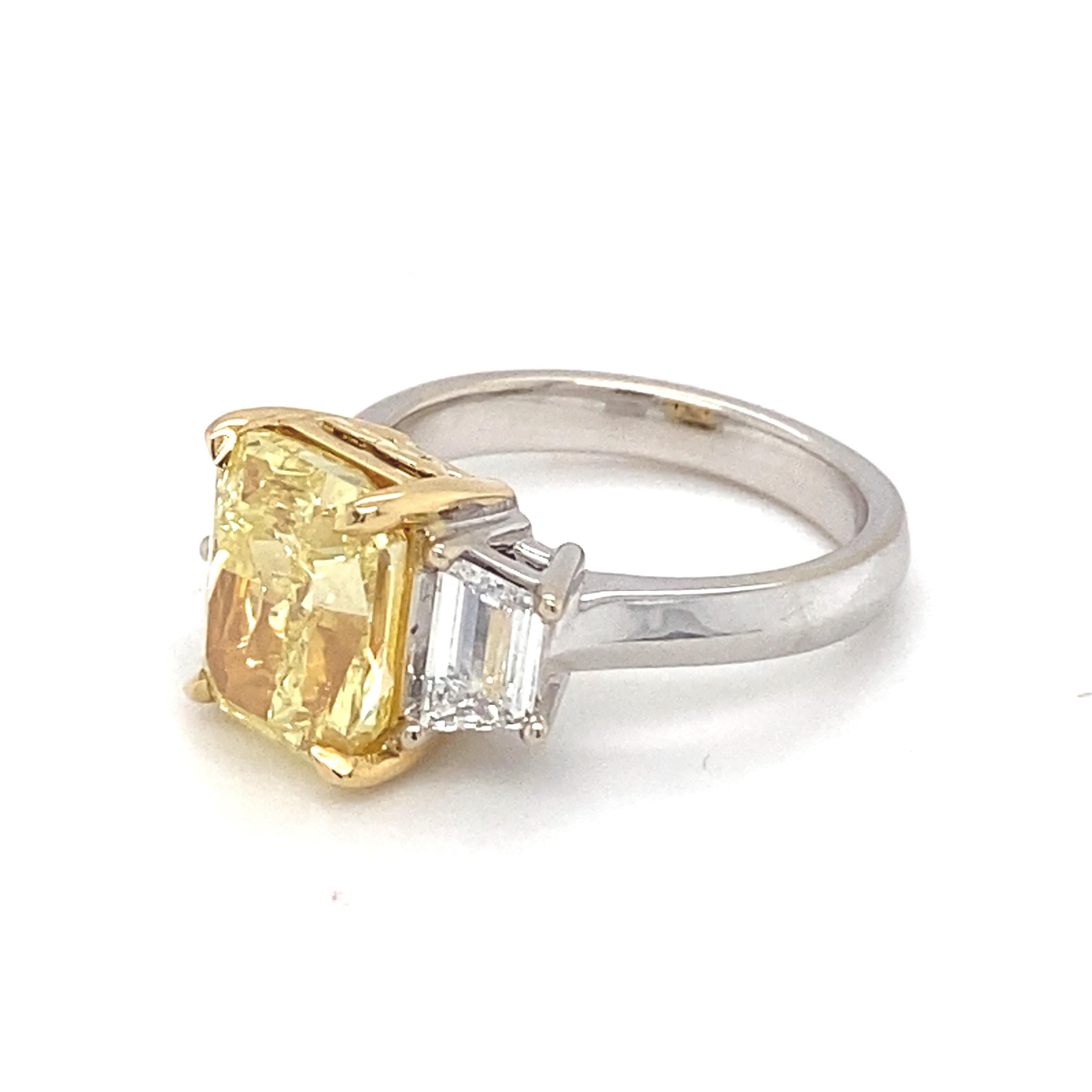GIA Certified 5.01 Carat Intense Fancy Yellow SI2 Cushion Diamond Ring For Sale 8