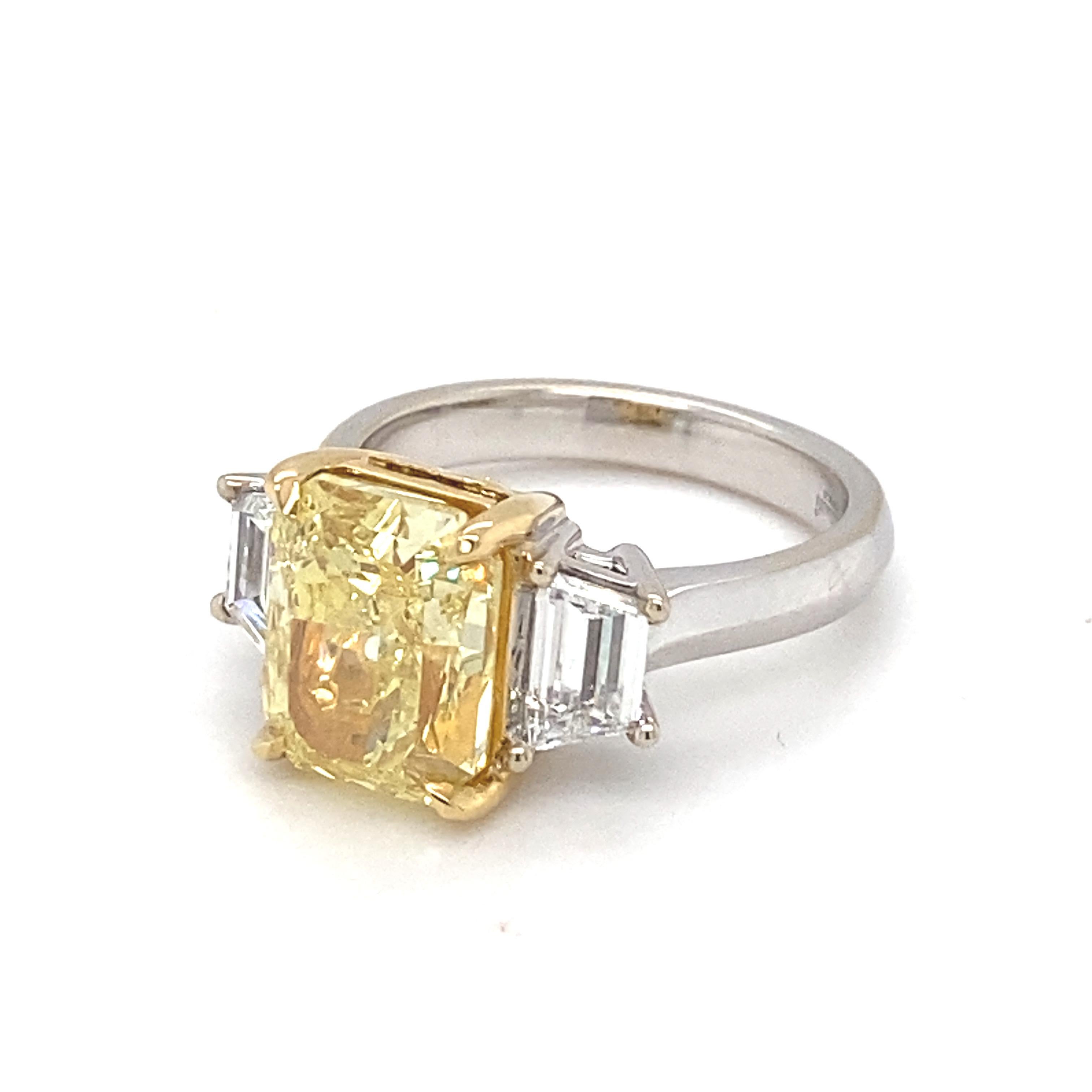 GIA Certified 5.01 Carat Intense Fancy Yellow SI2 Cushion Diamond Ring For Sale 10