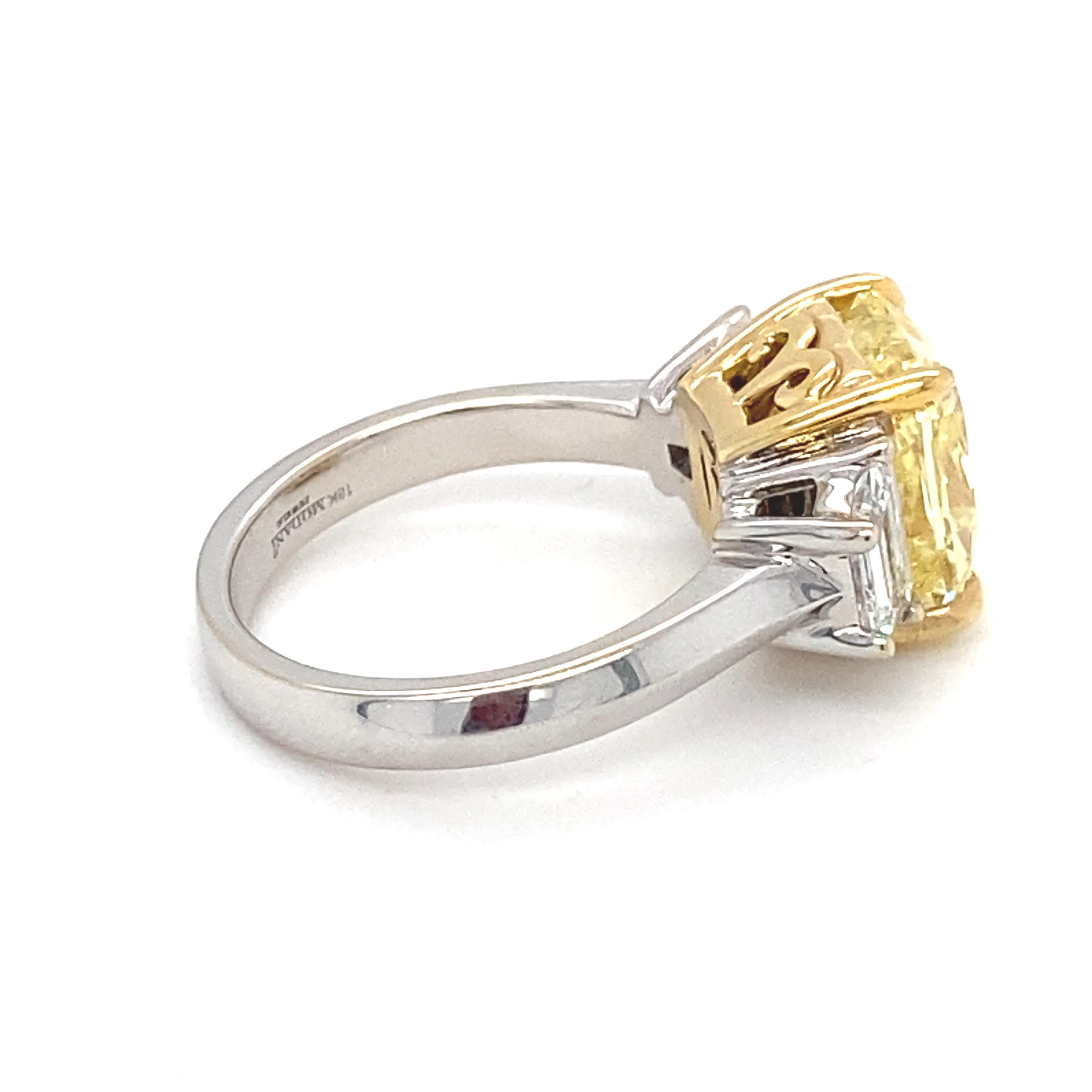 Women's GIA Certified 5.01 Carat Intense Fancy Yellow SI2 Cushion Diamond Ring For Sale