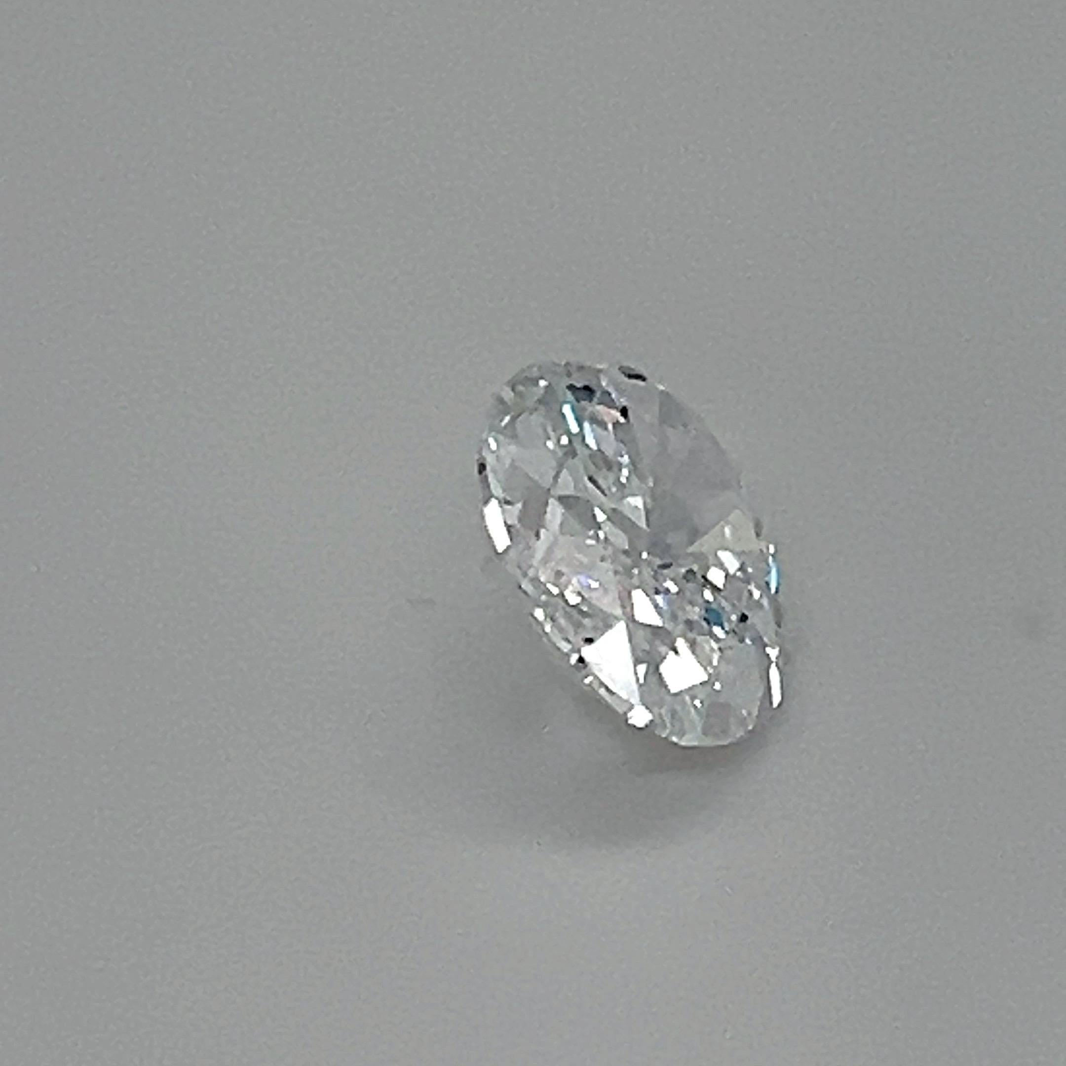 Women's or Men's GIA Certified 5.01 Carat Oval Cut D-IF Diamond Loose Gemstone For Sale
