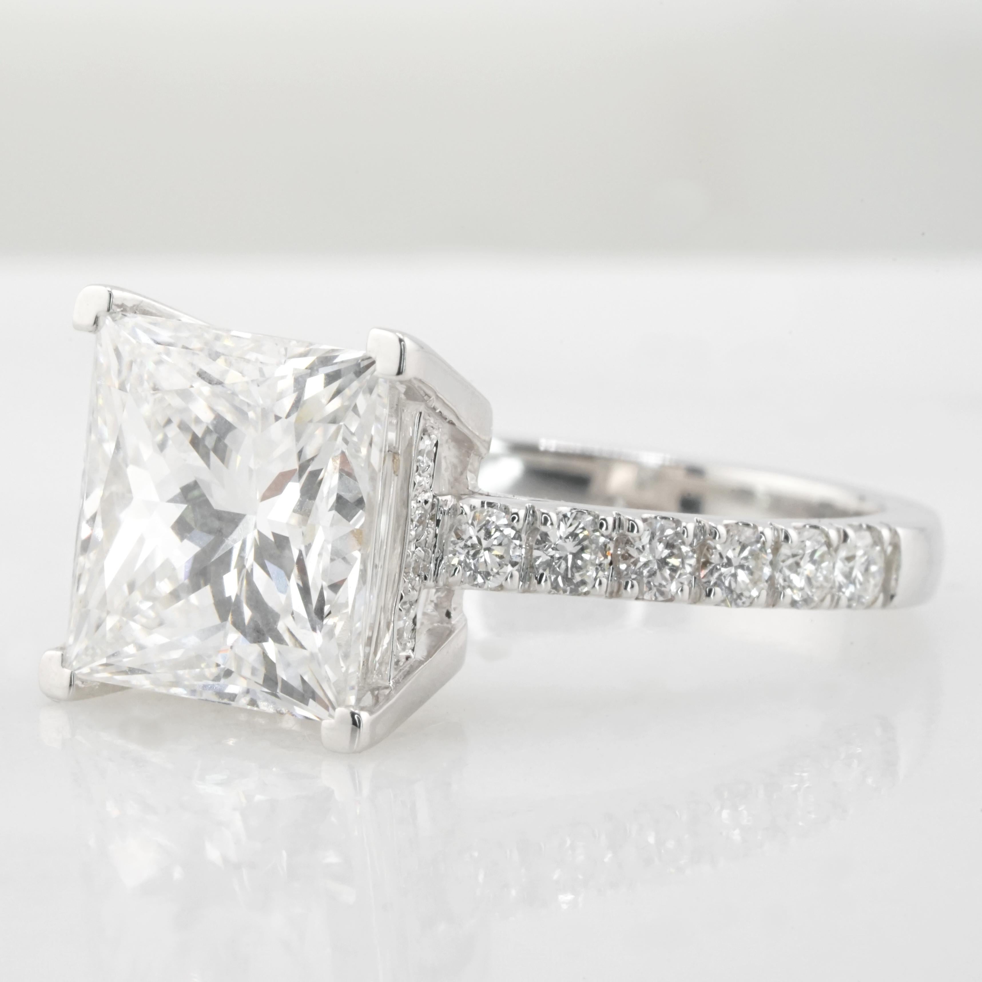 Contemporary GIA Certified 5.01 Carat Princess Cut Diamond with pavé Ring in 18K white Gold For Sale