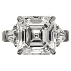 GIA Certified 5.01 Carat Sq.Emerald Cut Diamond F Color Ring with tapered baguet