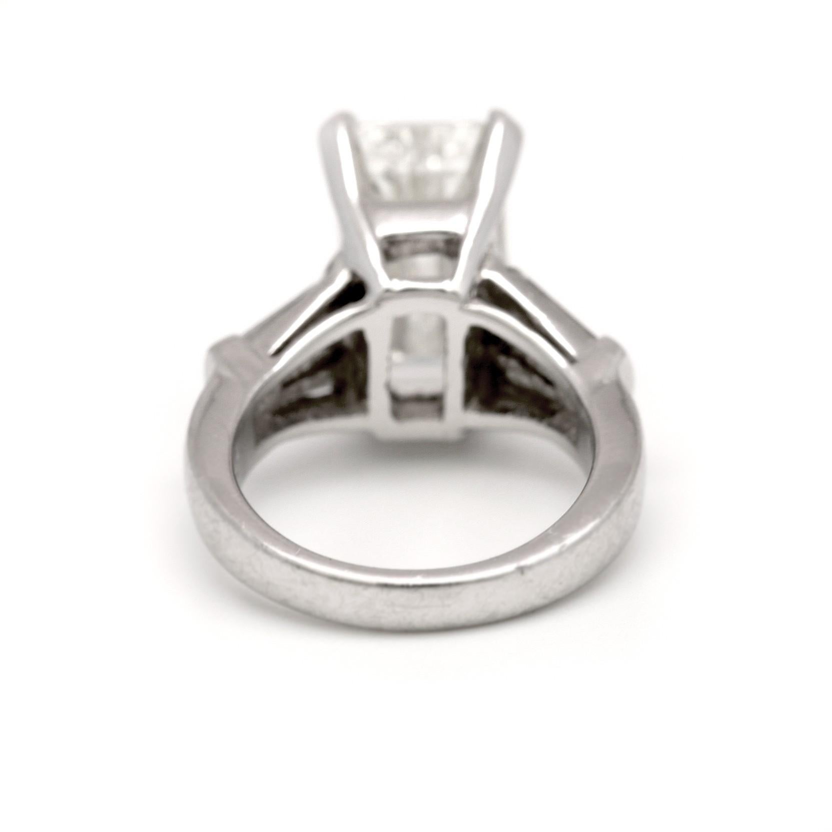Modern GIA Certified 5.02 Carat Emerald Cut Diamond Ring
