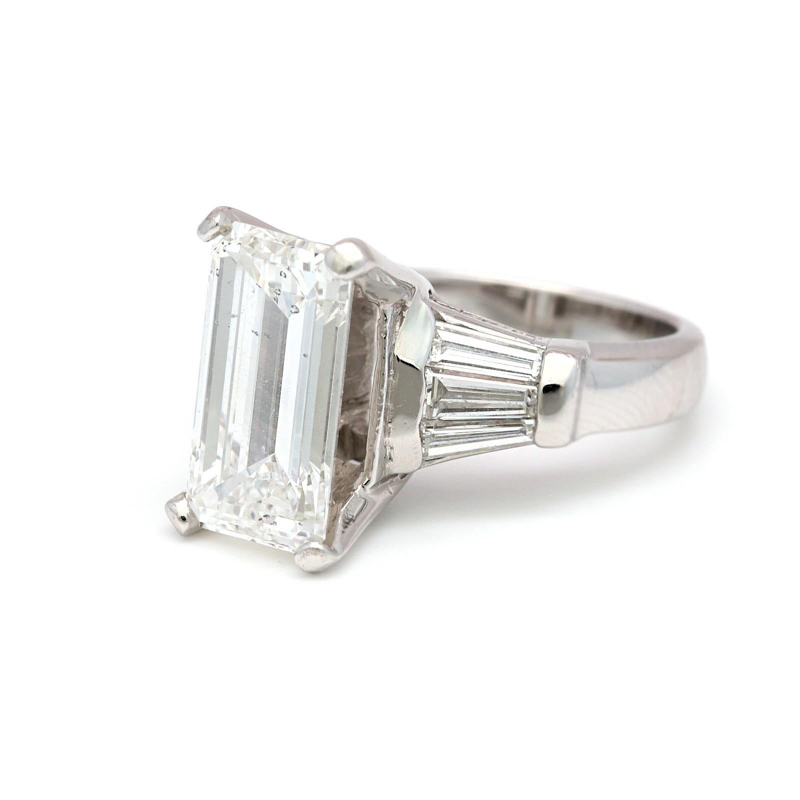GIA Certified 5.02 Carat Emerald Cut Diamond Ring In Excellent Condition In Los Angeles, CA