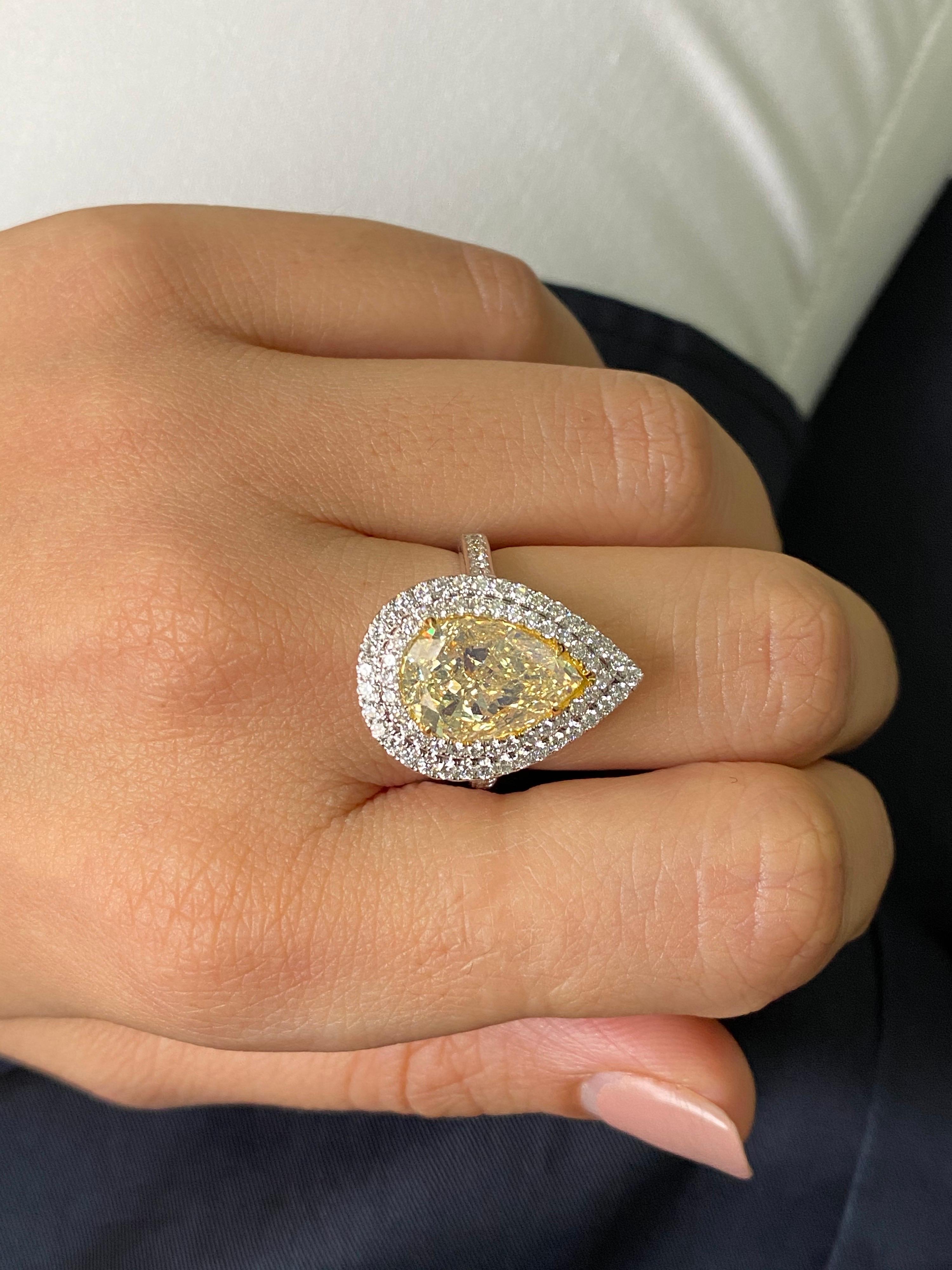 Modern GIA Certified 5.02 Carat Yellow Diamond Engagement Ring