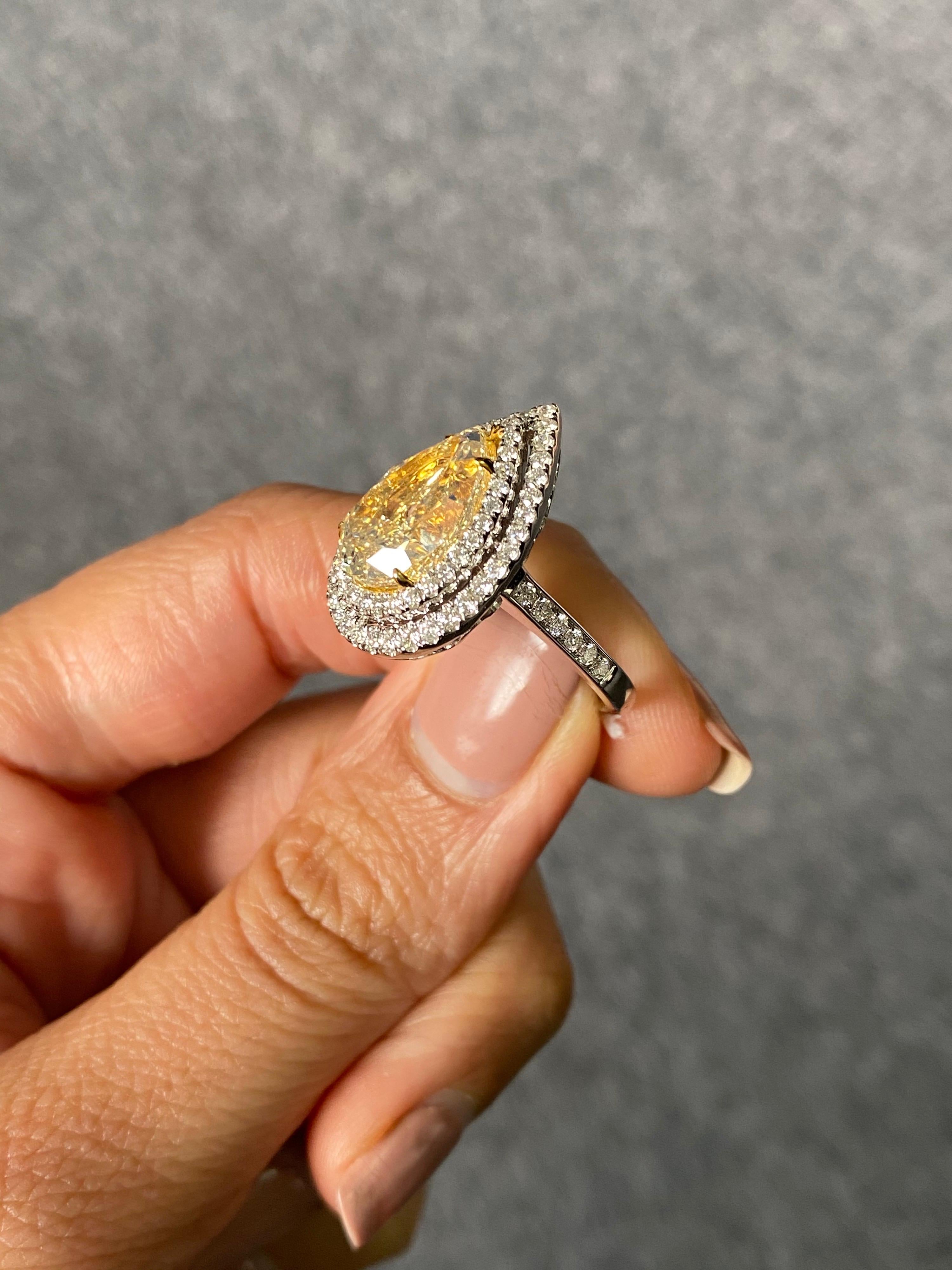 Pear Cut GIA Certified 5.02 Carat Yellow Diamond Engagement Ring