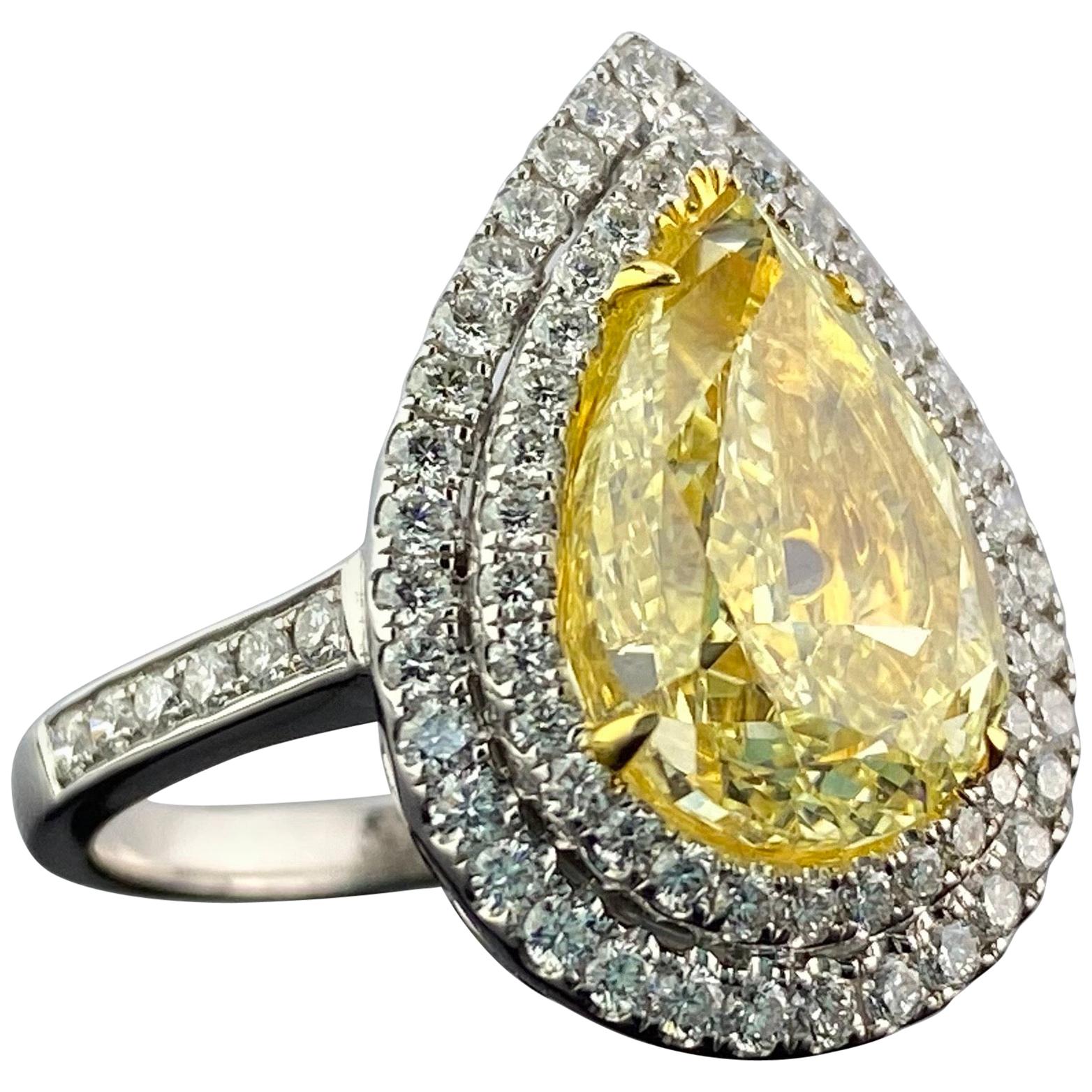 GIA Certified 5.02 Carat Yellow Diamond Engagement Ring