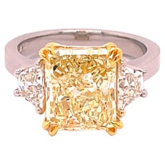 GIA Certified 5.02 Fancy Light Yellow Radiant Cut 3-Stone Engagement Ring