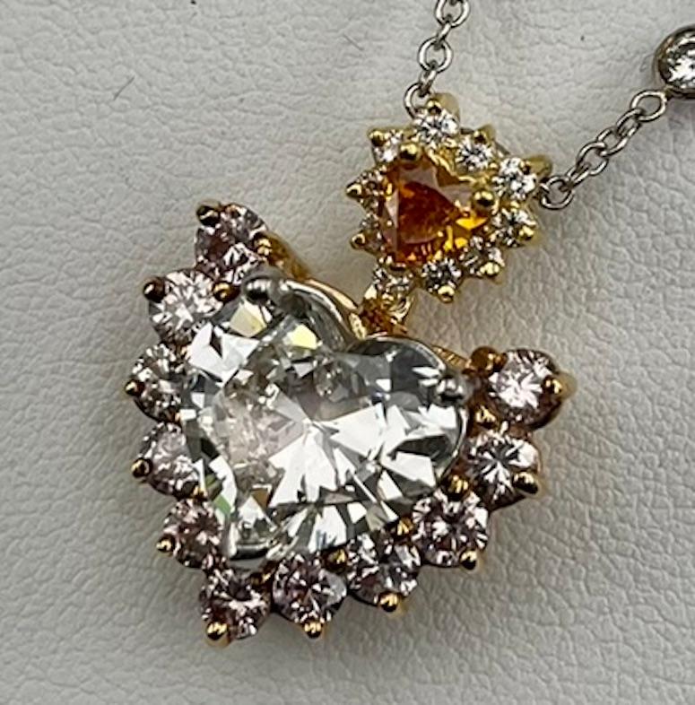 This gorgeous pendant features a beautifully cut Heart Shape Diamond, graded by GIA as being H in color and SI2 in clarity. The diamond appears very white, much closer to a G color and the clarity of the diamond is much closer to a VS2/SI1. There 
