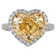 GIA-zertifizierter 5,03 Karat Fancy Gelber herzförmiger Diamant & Halo 18K Goldring