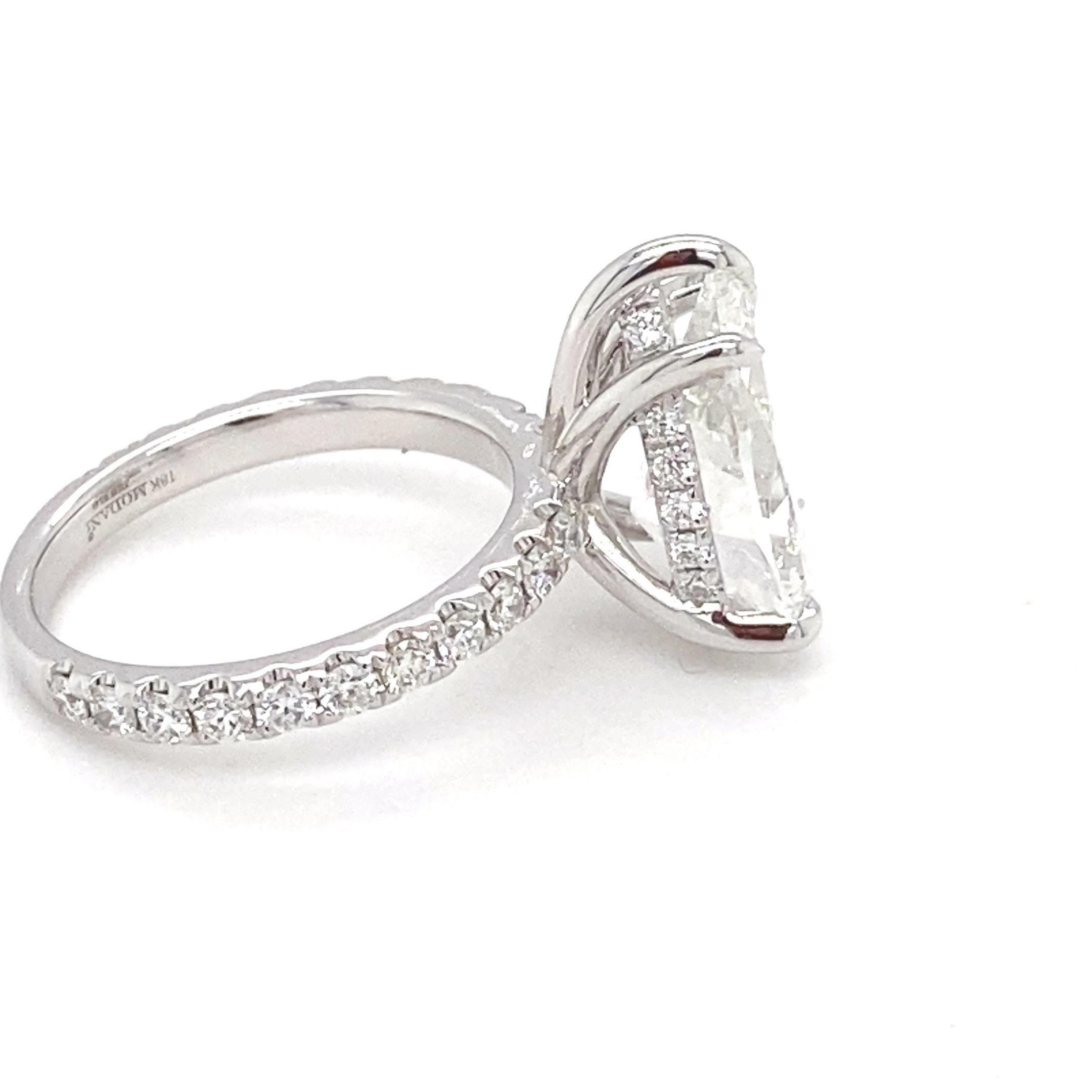 Women's GIA Certified 5.03 Carat Pear Shape H VS1 Diamond 18K Engagement Ring For Sale