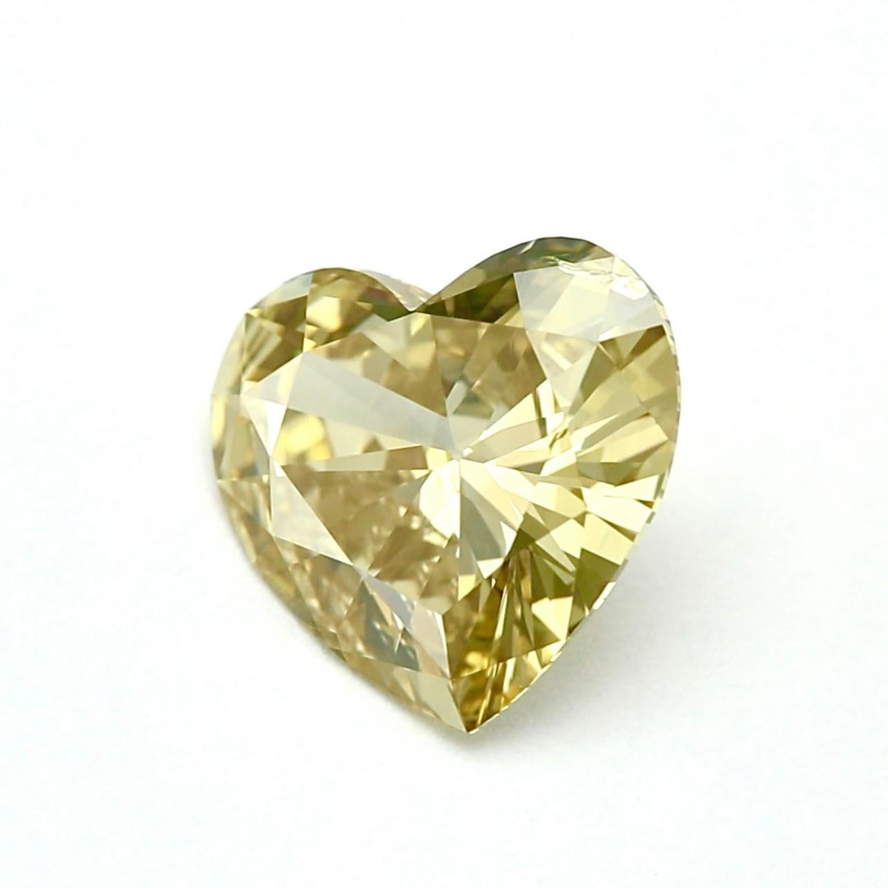 Introducing the Enchanting 5.03 Carat Heart Shape Diamond in Fancy Brownish Greenish Yellow - GIA Certified:

Prepare to be captivated by the extraordinary beauty of our 5.03 carat Heart Shape Diamond, boasting a rare and enchanting Fancy Brownish