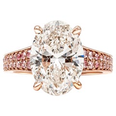 GIA Certified 5.04 Carats Oval Cut Diamond & Pink Side Stones Engagement Ring