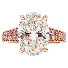 GIA Certified 5.04 Carats Oval Cut Diamond Engagement Ring with Pink Stones 