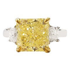 GIA Certified 5.05 Carat Fancy Intense Yellow Diamond Platinum Engagement Ring