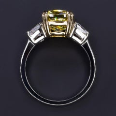 GIA Certified 5.10 Carat Cushion Cut Fancy Yellow Diamond Clarity Ring