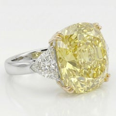 GIA Certified 5.06 Carat Fancy Yellow Cushion Cut Diamond Ring with Trillion