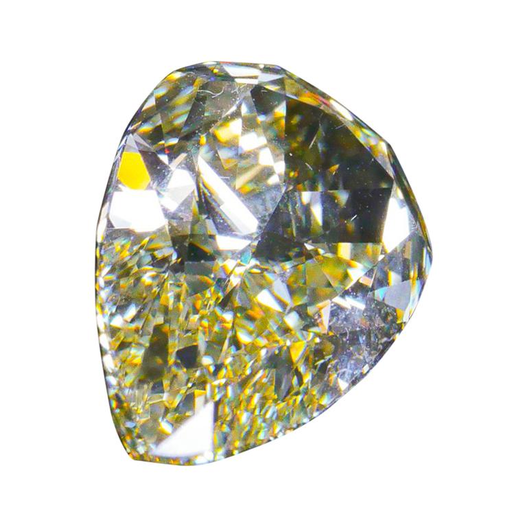 GIA Certified 5.06 Carat Fancy Yellow Pear Cut Diamond For Sale