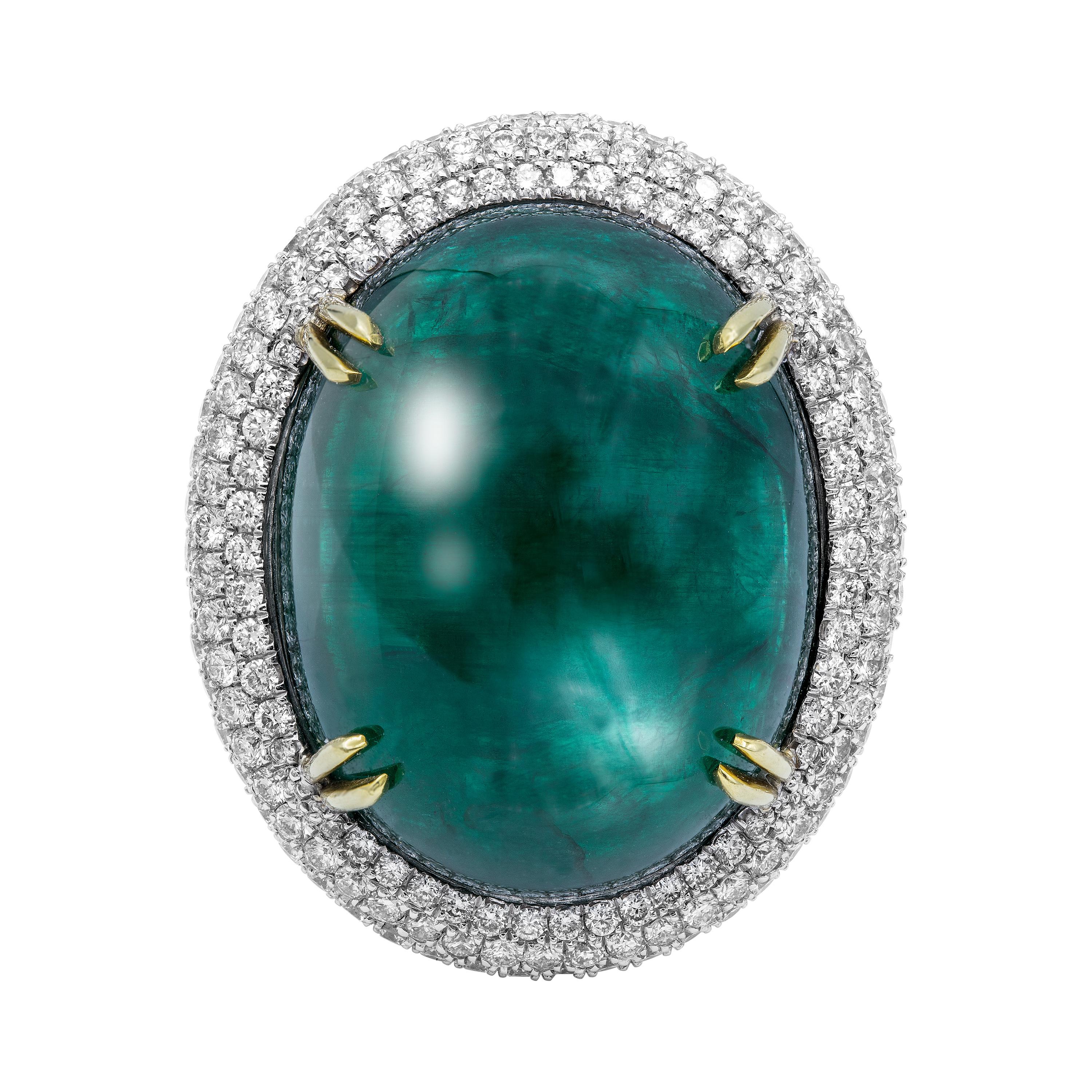 GIA Certified 50.6ct Oval Emerald Cabochon Diamond Cocktail Ring

GIA#6173253976

Exceptional GIA certified Green Emerald with diamond accents set and mounted in 18k White gold.

The stone is a real gem, rare to find in this color , the deep green