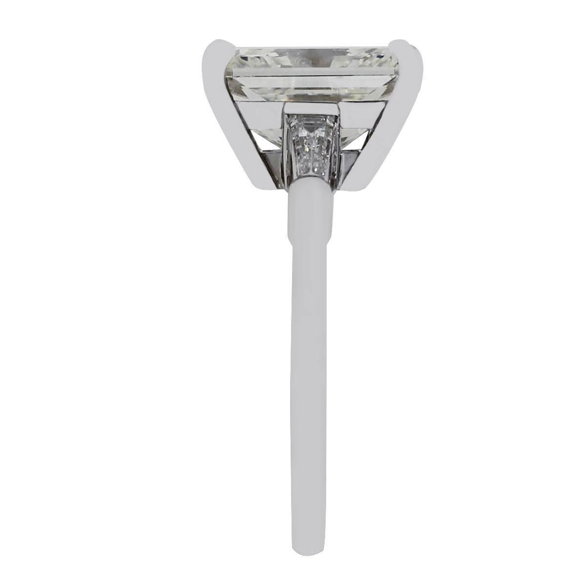Material: 14k white gold
Center Diamond Details: 5.07ct radiant cut diamond. Center diamond is J in color and VS2 in clarity. Center diamond is GIA certified (2175352615)
Diamond Details: Approximately 0.20ctw baguette cut diamonds.
Size: 7.75
Total